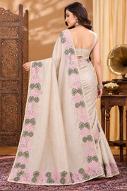 Back view of beige Tussar silk cutwork saree and blouse